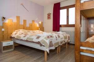 Postel nebo postele na pokoji v ubytování Gîte Châtel