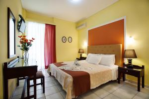 Ένα ή περισσότερα κρεβάτια σε δωμάτιο στο Lida Apartments