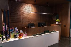 a reception desk in a store with a counter top at St. George Hotel in Sofia