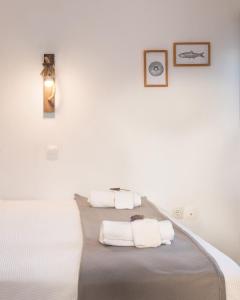 A bed or beds in a room at SeaView Apartment & Studio