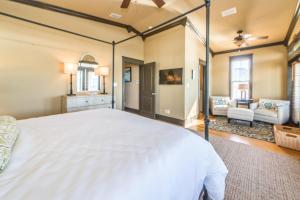 a large bedroom with a bed and a living room at Comfort and Joy in Seacrest +56 photos