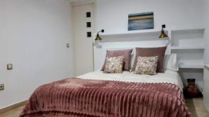 Postel nebo postele na pokoji v ubytování Valencia Green Penthouse