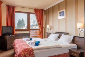 מיטה או מיטות בחדר ב-Hanka Relax & Spa