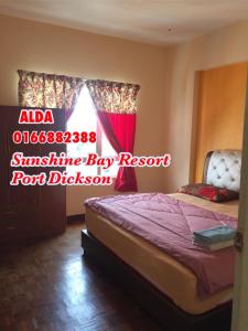 Postel nebo postele na pokoji v ubytování Sunshine Bay Resort Port Dickson