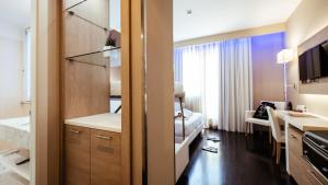 Kuchyň nebo kuchyňský kout v ubytování Raffaello Hotel & Mooka Restaurant