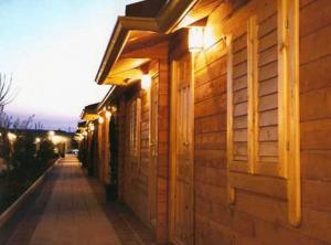 a row of lights on the side of a building at Hostal Gran Avenida in Tarancón