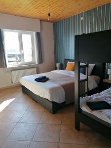 Postel nebo postele na pokoji v ubytování 't Zuden van Aertrycke