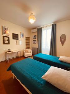 Кровать или кровати в номере La maison Gerval