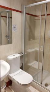 Kúpeľňa v ubytovaní Hotel Cuéntame