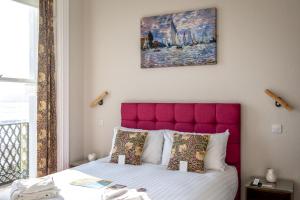 Postel nebo postele na pokoji v ubytování Gresham Guest House