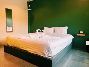 Postel nebo postele na pokoji v ubytování ViVi Hotel Resort