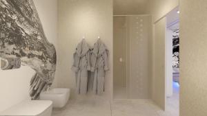 Salle de bains dans l'établissement Unico Hotel Caorle