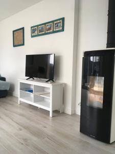 TV a/nebo společenská místnost v ubytování Kercady 2