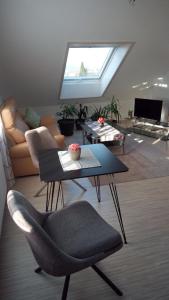 Un televizor și/sau centru de divertisment la Ferienwohnung am Bodensee +23 fotografii