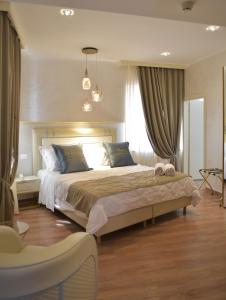Postel nebo postele na pokoji v ubytování Amsterdam Suite Hotel & SPA