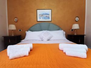 Postel nebo postele na pokoji v ubytování Nesea Naxos - Sicilian Suite
