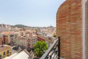 Výhľad na mesto Malaga alebo výhľad na mesto priamo z apartmánu