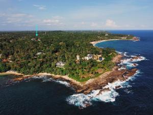 an aerial view of an island in the ocean at Little Tamarind in Tangalle
