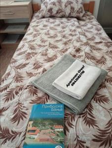 Uma cama ou camas num quarto em Apartman Oreol