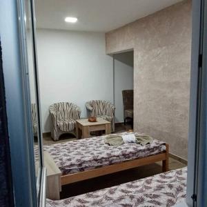 Uma área de estar em Apartman Oreol