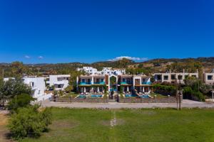 arial view of a villa with a resort at Horizon Line Villas in Kiotari +20 photos