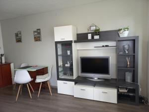 Kuchyňa alebo kuchynka v ubytovaní Berik Apartman