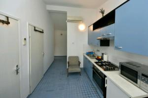 Kuchyň nebo kuchyňský kout v ubytování Apartman Zora