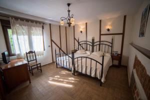 Postel nebo postele na pokoji v ubytování Hotel Casa Beletri
