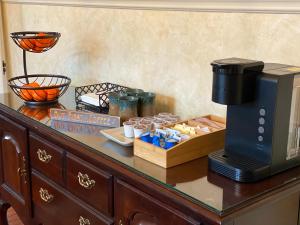 a table with a coffee maker and a microwave at Terrell House B&B in Burnsville +47 photos