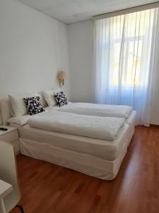 Letto o letti in una camera di Hotel Corona