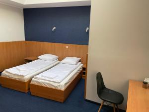 Posteľ alebo postele v izbe v ubytovaní Garbarska 22 Aparthotel