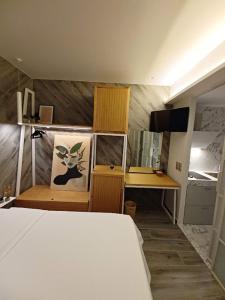 Postel nebo postele na pokoji v ubytování Sroom Apartment