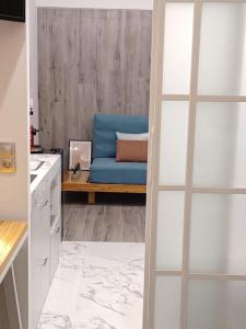 Kuchyň nebo kuchyňský kout v ubytování Sroom Apartment