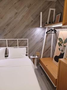 Postel nebo postele na pokoji v ubytování Sroom Apartment