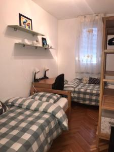 Postel nebo postele na pokoji v ubytování Apartment Bucka