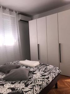 Postel nebo postele na pokoji v ubytování Apartment Bucka