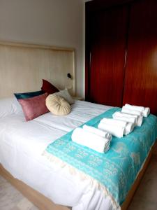 Llit o llits en una habitació de IJD apartments 119 PARKING GRATIS Y PISCINA