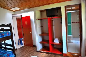 Łóżko lub łóżka w pokoju w obiekcie Hotel Itzamana
