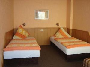 Postel nebo postele na pokoji v ubytování Hotel Andernacher Hof