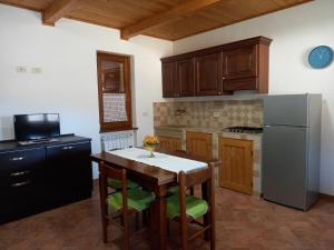 Kuchyň nebo kuchyňský kout v ubytování Casa Vacanze La Venarella