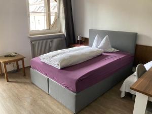 Postel nebo postele na pokoji v ubytování Hotel Luitpold