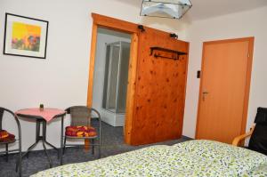 Postel nebo postele na pokoji v ubytování Haus Dachstein Schnitzer