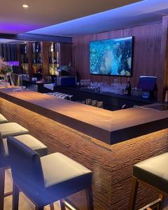 Khu vực lounge/bar tại Zimmer & Appartements am Schloßplatz