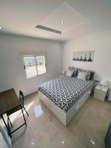 Postel nebo postele na pokoji v ubytování SUN VILLA