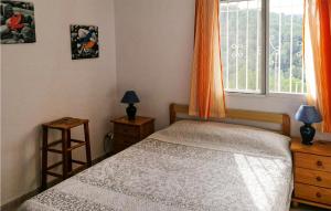 Posteľ alebo postele v izbe v ubytovaní Pet Friendly Home In La Font Den Carros