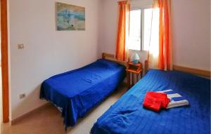 Posteľ alebo postele v izbe v ubytovaní Pet Friendly Home In La Font Den Carros