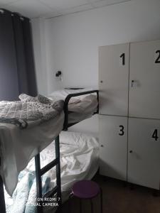 Voodi või voodid majutusasutuse Hostel Allegro toas