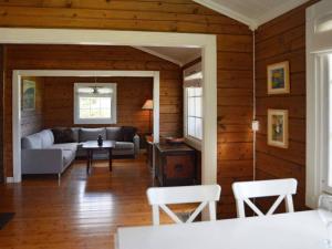 A seating area at Holiday home Utvik III