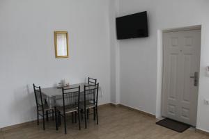 A television and/or entertainment centre at HAROULENA