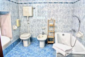 Kúpeľňa v ubytovaní Hotel Torcolo "Residenze del Cuore" + 33 fotografií